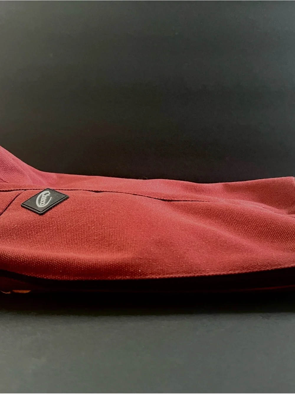 Chaco Men's Burgundy Red Sling Bag with Orange, Black and White Strap Detail